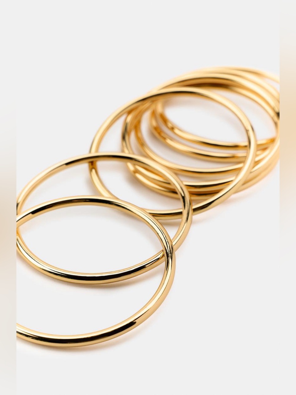 NWOT. Zara Golden Set of Several Rigid Metal Bracelets.